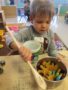 cadence-academy-ken-caryl-preschool-boy-cooking_573-338x450