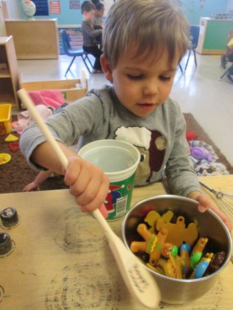 cadence-academy-ken-caryl-preschool-boy-cooking_573-338x450