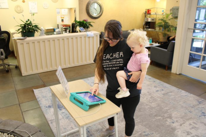 cadence_education_local_photos_campaign_6820_w_121st_st_leawood_ks_66209_usa_parents_signing_children_in-04-24-2024-17145921815390.4780224134134019