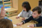 cadence_education_local_photos_campaign_934_main_st_east_greenwich_ri_02818_usa_group_of_children_playingreading-02-09-2024-17077824351300.6789262275194357