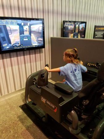 caterpillar_simulator_during_field_trip_at_rogys_learning_place_east_peoria_il-338x450