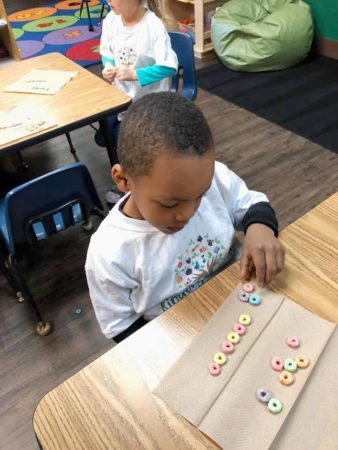 cereal_counting_activity_at_the_bridge_learning_center_carrollton_ga-338x450