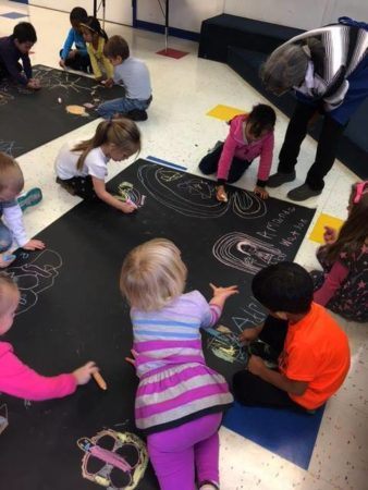 chalk_art_project_on_black_paper_cadence_academy_preschool_allen_tx-338x450