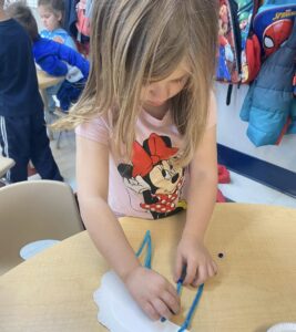 child doing art