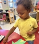child hands on learning at cadence academy preschool and daycare raintree in charlotte, north carolina