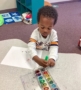 child using watercolor and painting at preschool and daycare at cadence academy preschool smyrna, delaware
