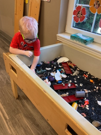 Child playing inside with toys at Cadence Academy Preschool and Daycare Yelm Highway in Olympia, Washington