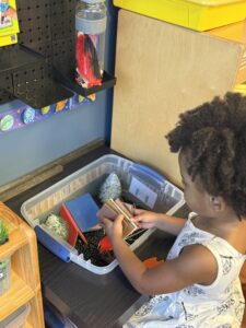 child playing with toys at cadence academy preschool at southaven