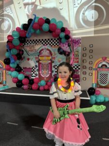 child posing at school function at cadence academy preschool at southaven
