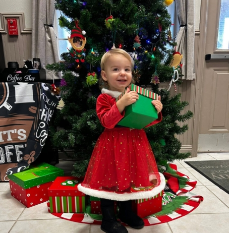 child posing for christmas at preschool and daycare at cadence academy preschool forney, texas