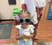 child posing with glasses at cadence academy preschool at southaven