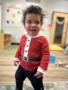 child smiling during christmas at cadence academy preschool eastfield in huntersville, North Carolina