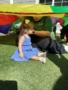 child under parachute at preschool and daycare cadence academy preschool nolensville 504