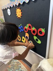 child with hands on activity at cadence academy preschool at southaven
