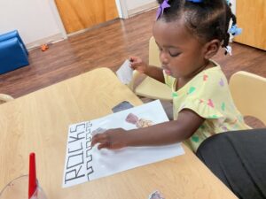 Child working on paper learning at Cadence Academy Preschool Olive Branch, Mississippi