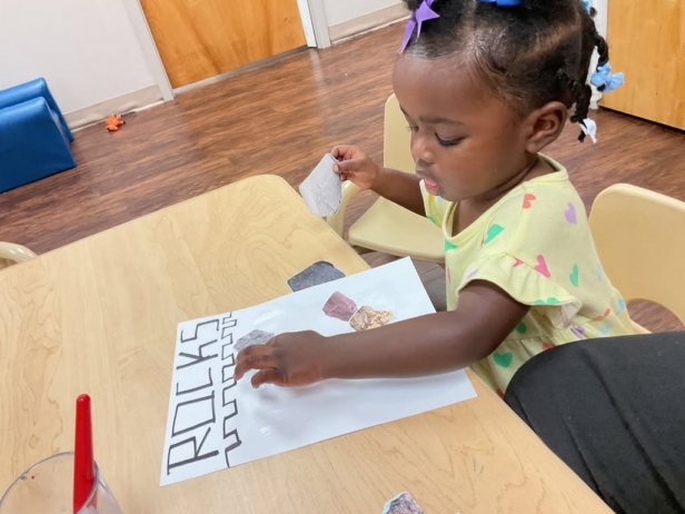 Child working on paper learning at Cadence Academy Preschool Olive Branch, Mississippi