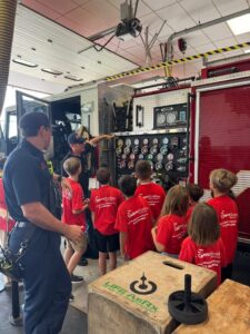 children at fire station at preschool and daycare at cadence academy preschool in the colony texas