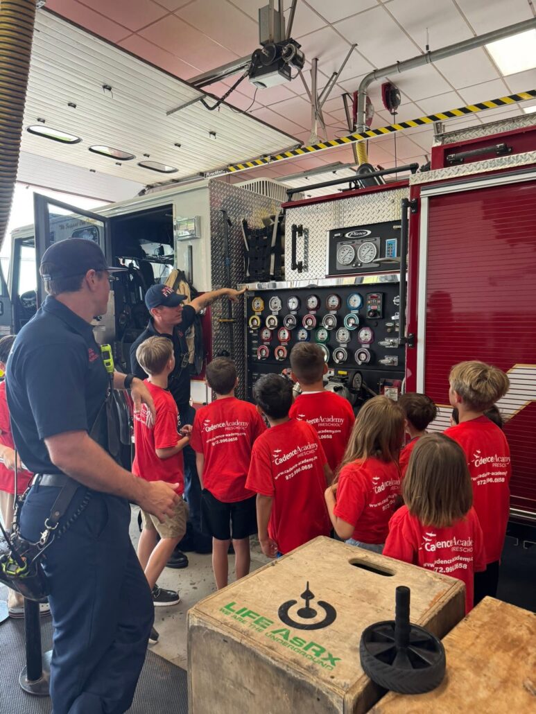 children at fire station at preschool and daycare at cadence academy preschool in the colony texas