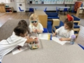 children drawing together at preschool and daycare at cadence academy preschool in the colony texas