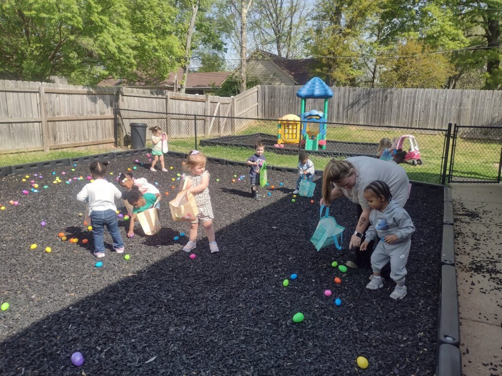 Children doing easter egg hunt at preschool and daycare at Cadence Academy Preschool Olive Branch, Mississippi