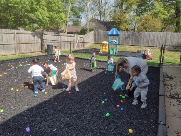 Children doing easter egg hunt at preschool and daycare at Cadence Academy Preschool Olive Branch, Mississippi