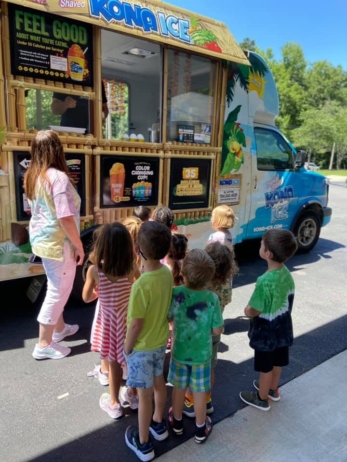 children getting kona ice at cadence academy preschool eastfield in huntersville, North Carolina