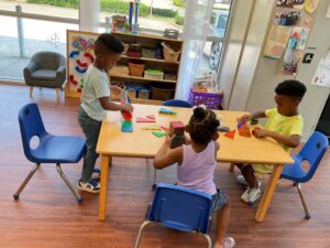 children with hands on activity at cadence academy preschool at southaven