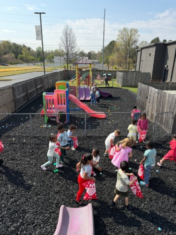 children hunting for easter eggs