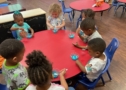 Children at desk learning at preschool and daycare at Cadence Academy Preschool Olive Branch, Mississippi