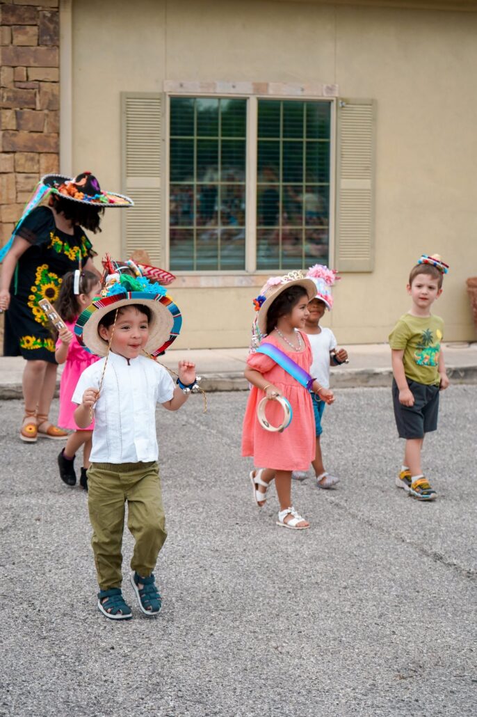 children in parade at preschool and daycare of 339 wild horse