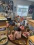 children listening to teacher in classroom circle at preschool and daycare cadence academy preschool 502 spring hill