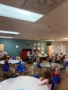 children listening to teacher speak at preschool and daycare at cadence academy preschool in the colony texas