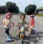 children on bikes outside together smiling at preschool and daycare cadence academy preschool 502 spring hill
