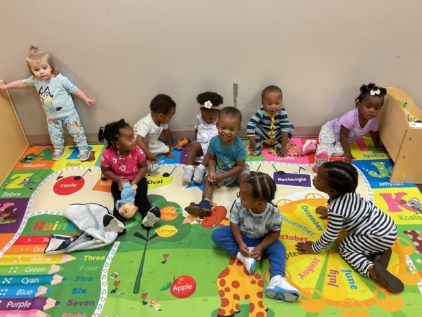 Children playing on carpet at preschool and daycare at Cadence Academy Preschool Olive Branch, Mississippi