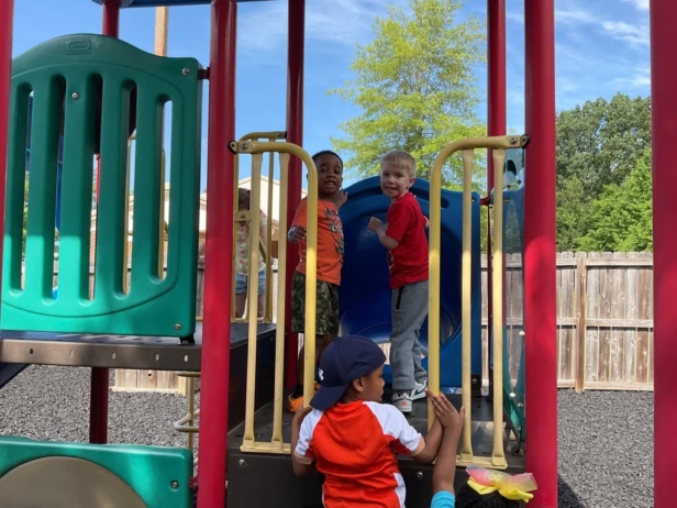 Children on playground at preschool and daycare at Cadence Academy Preschool Olive Branch, Mississippi