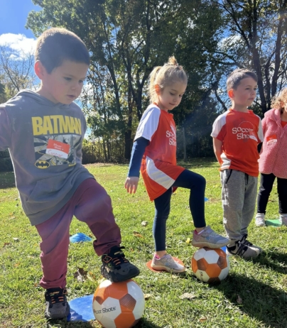children playing soccer at preschool and daycare at at creative kids childcare center kent new york