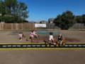 children riding tricycle at preschool and daycare at cadence academy preschool forney, texas