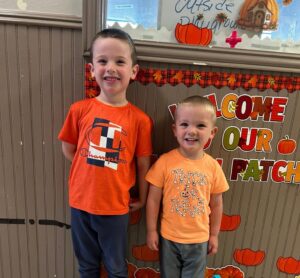 child smiling for fall at preschool and daycare at cadence academy preschool forney, texas