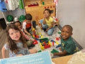 children smiling in classroom 503 cordova (2)