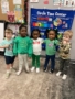 children smiling in classroom 503 cordova