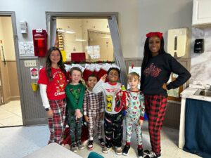 children smiling in pjs at preschool and daycare at cadence academy preschool forney, texas
