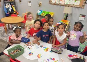 children smiling with craft 503 cordova