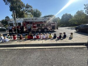 children learning from firefighters at cadence academy preschool and daycare raintree in charlotte, north carolina