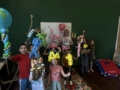 Children posing in classroom after balloon activity at Cadence academy preschool and daycare 505 murfreesboro