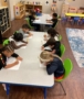 Children working at desk at preschool and daycare at Cadence Academy Preschool Olive Branch, Mississippi