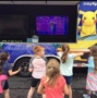 children_playing_dance_game_on_trailer_growing_kids_academy_fredericksburg_va-446x450
