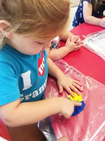 color_mixing_activity_at_cadence_academy_preschool_charleston_sc-338x450