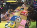 coloring_with_markers_at_cadence_academy_preschool_dallas_tx-600x450