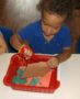 cutting_with_safety_scissors_at_cadence_academy_preschool_franklin_tn-367x450