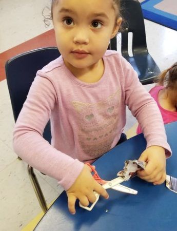 cutting_with_safety_scissors_at_cadence_academy_preschool_northeast_columbia_sc-345x450
